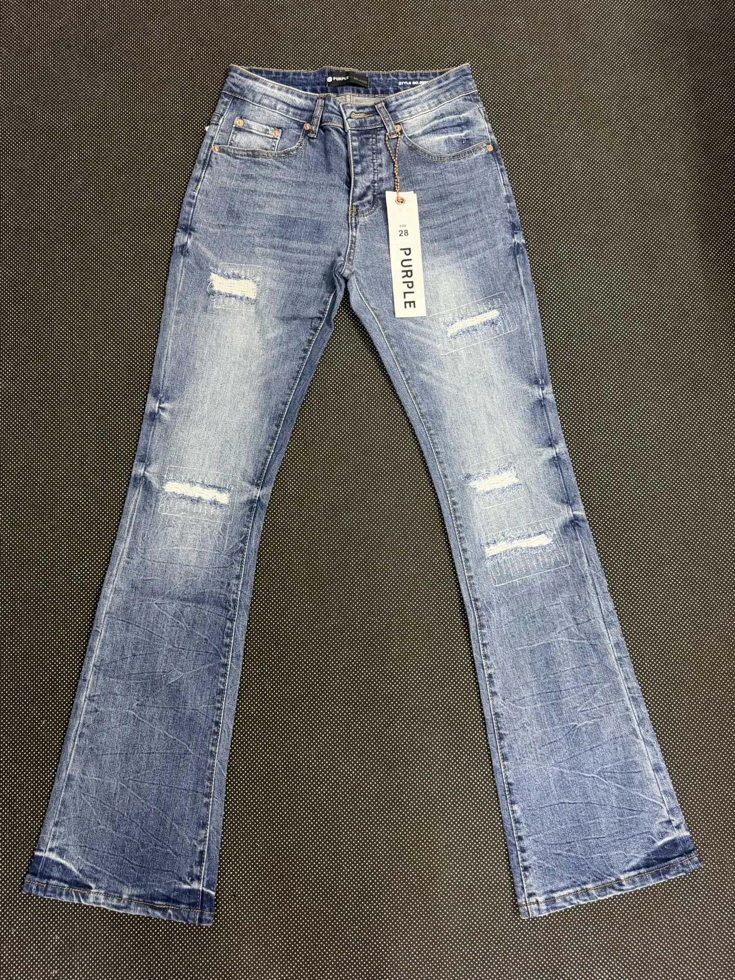 Distressed Bootcut Jeans with Patchwork Detail D19023140