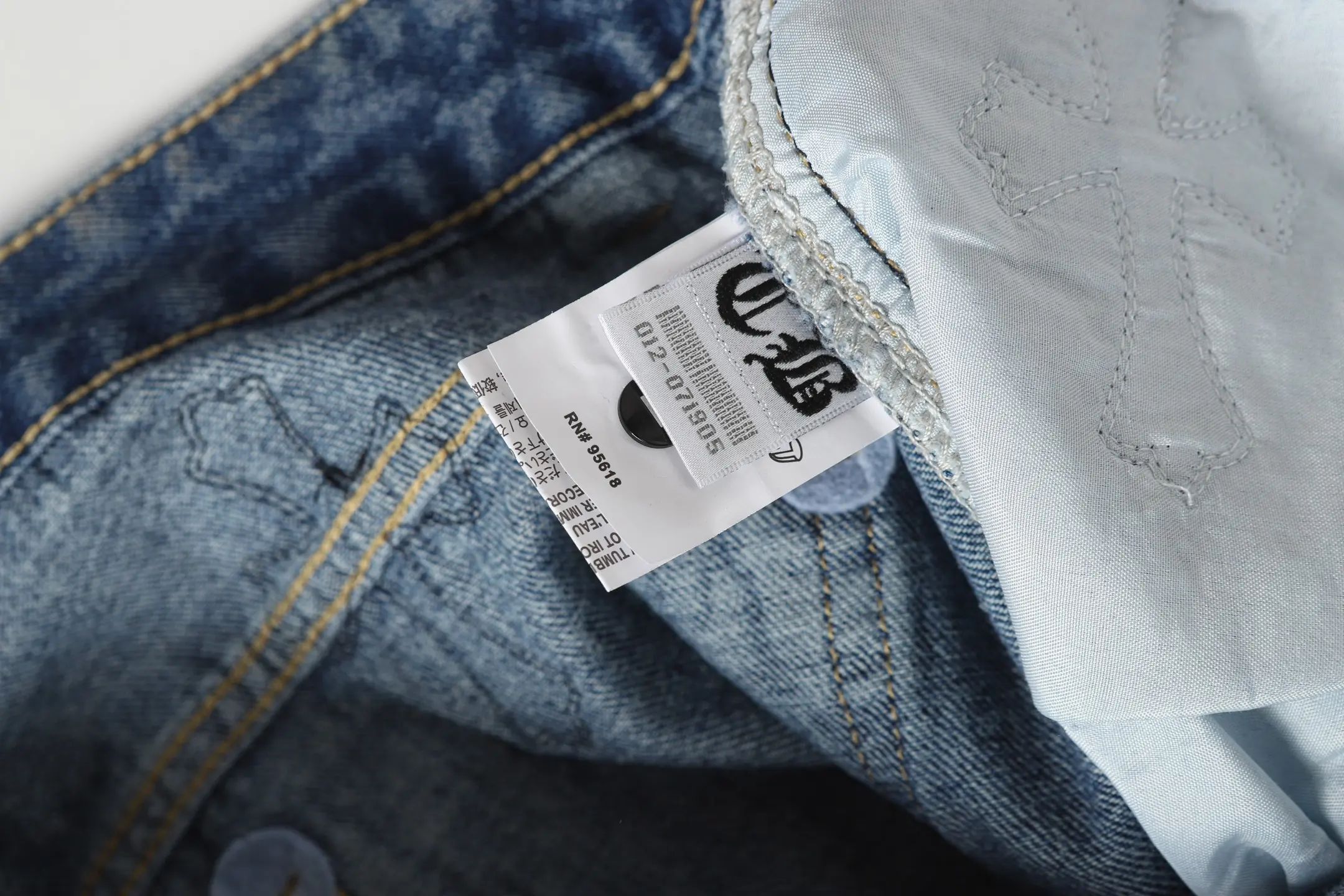 Cross-Patch Appliqué Straight-Leg Jeans D15513882 — view 7