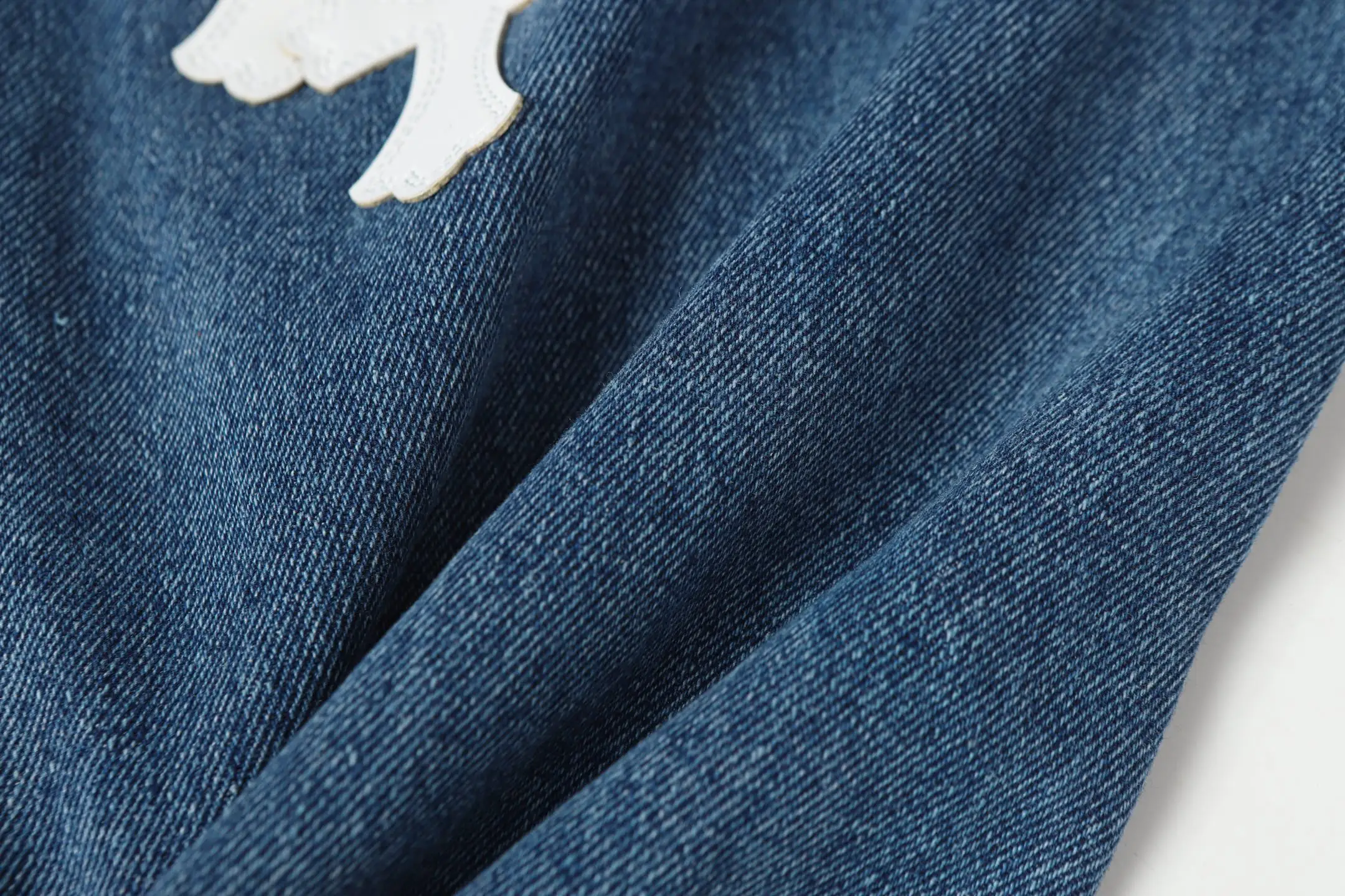 Cross-Patch Appliqué Straight-Leg Jeans D15513882 — view 15