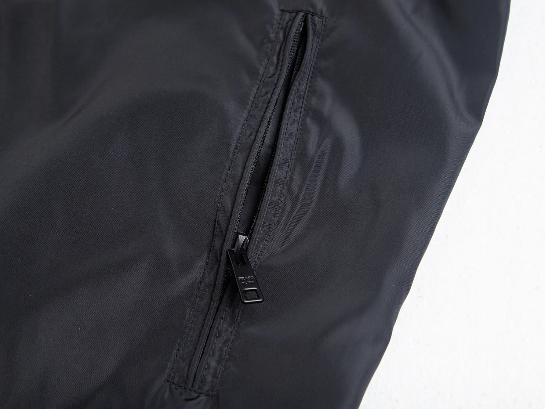 Triangle Logo Hooded Windbreaker Jacket D32521739 — view 9