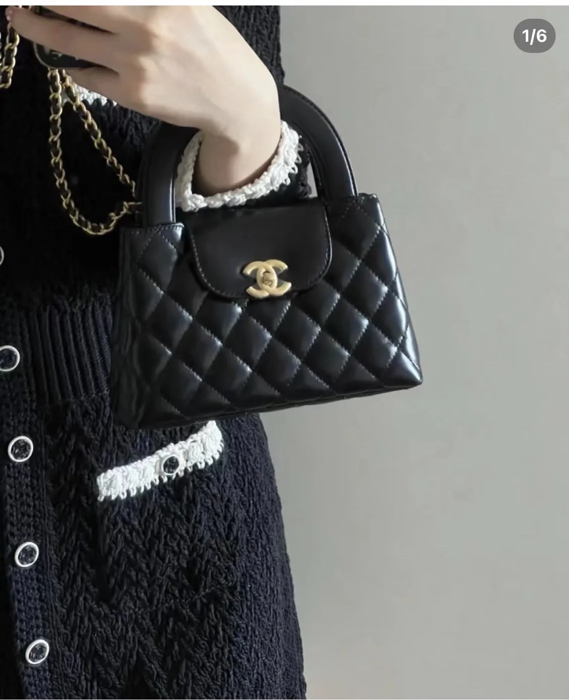 Quilted Leather Top-Handle Bag D41018474
