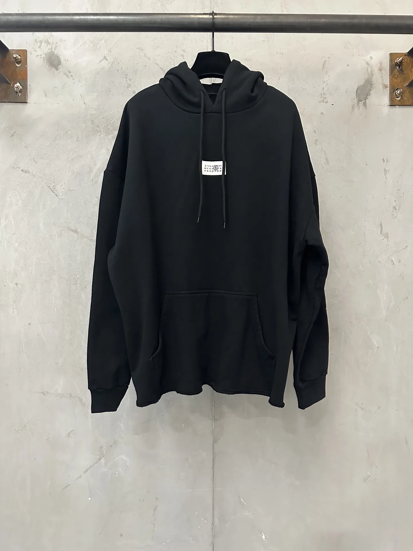 MM6 Logo Patch Distressed Hem Hoodie D27021816