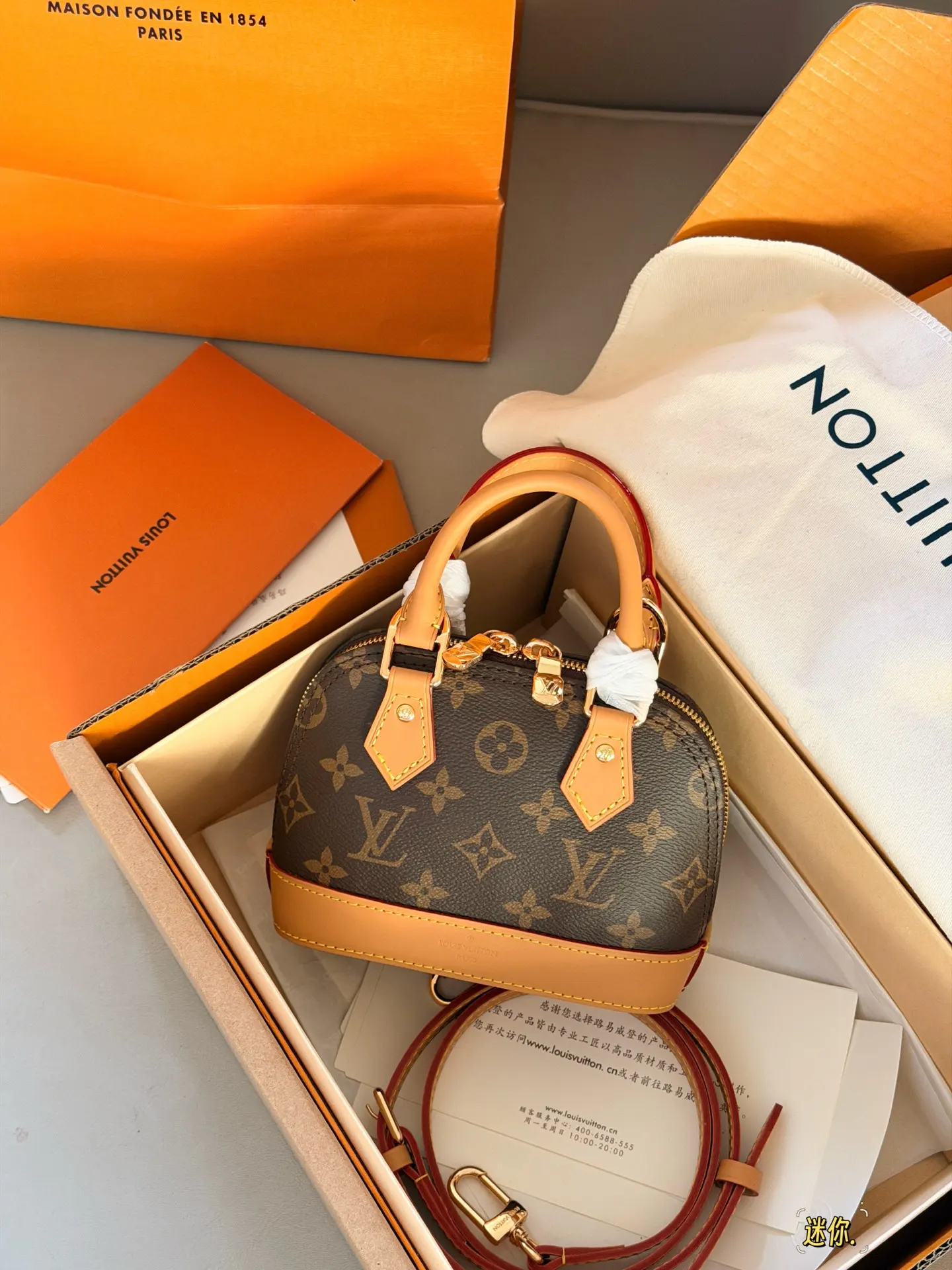 Alma Nano Monogram Top-Handle Bag D30018170 — view 2