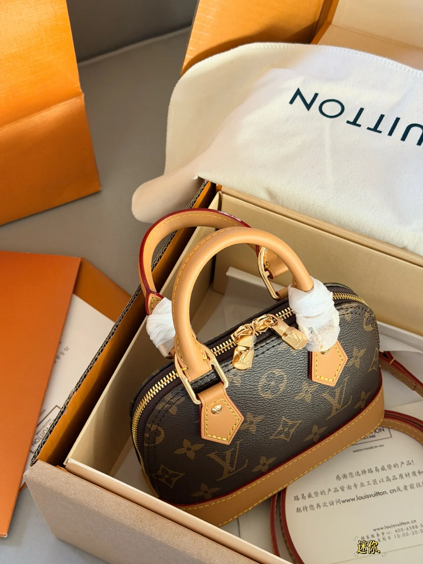 Alma Nano Monogram Top-Handle Bag D30018170 — view 7
