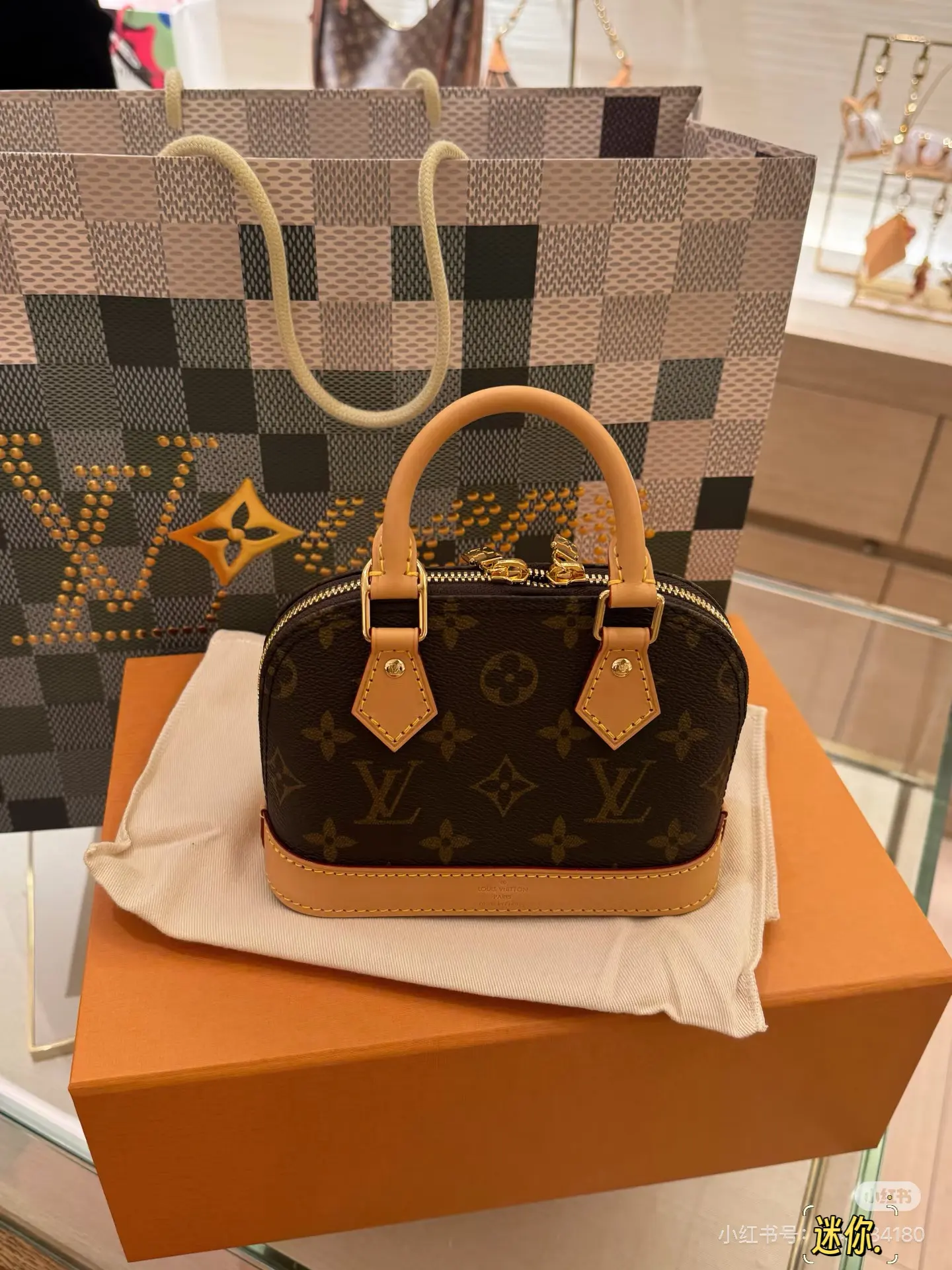 Alma Nano Monogram Top-Handle Bag D30018170 — view 10