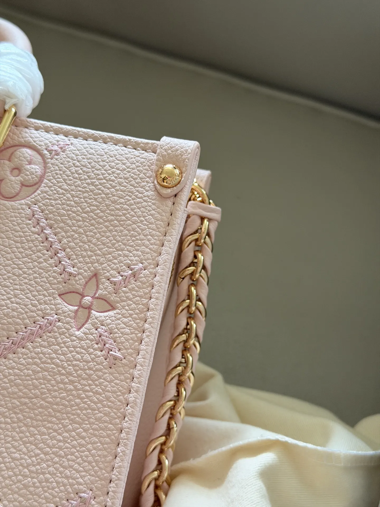 OnTheGo East West Monogram Empreinte Bag D32018248 — view 7
