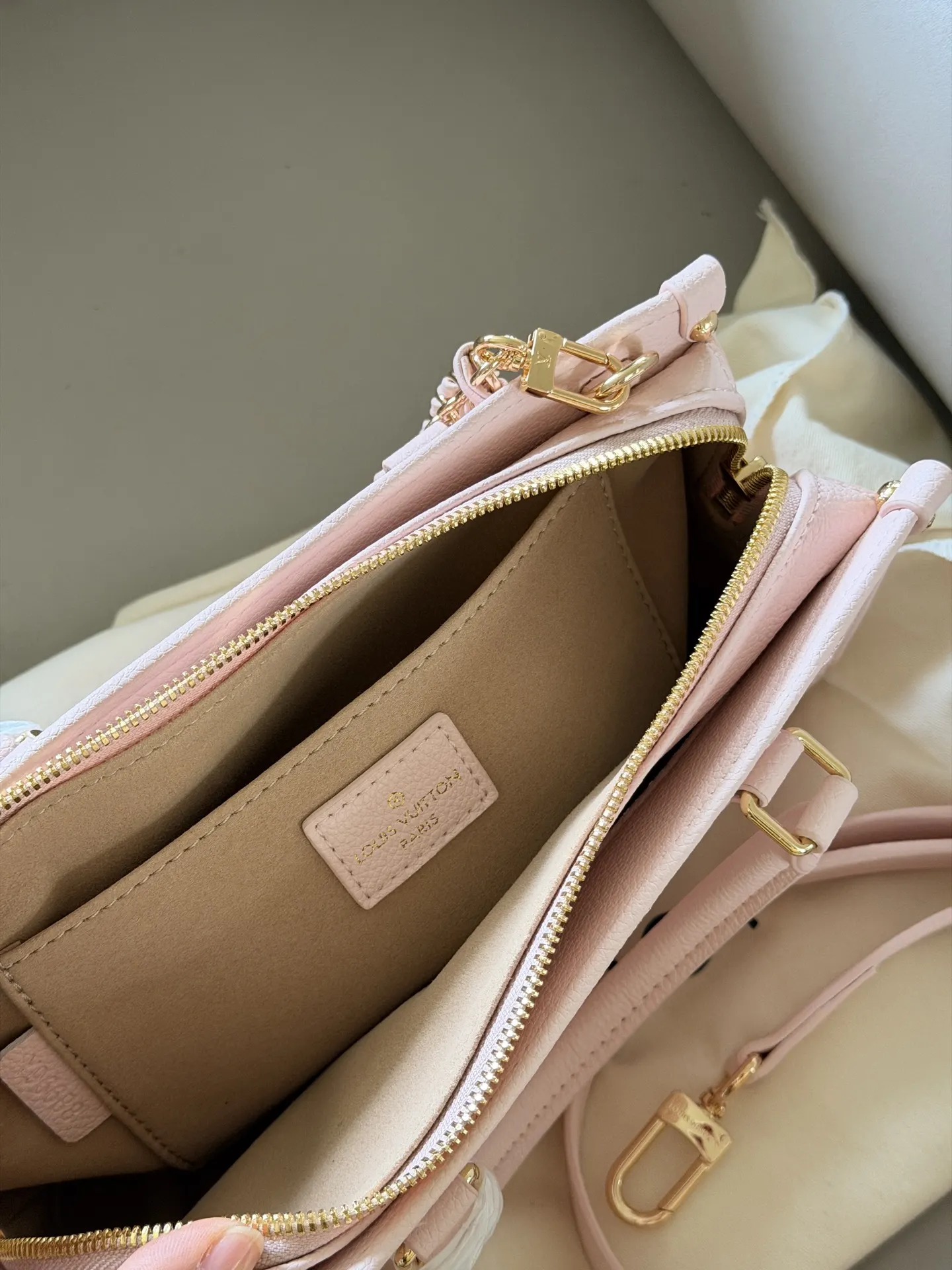 OnTheGo East West Monogram Empreinte Bag D32018248 — view 9
