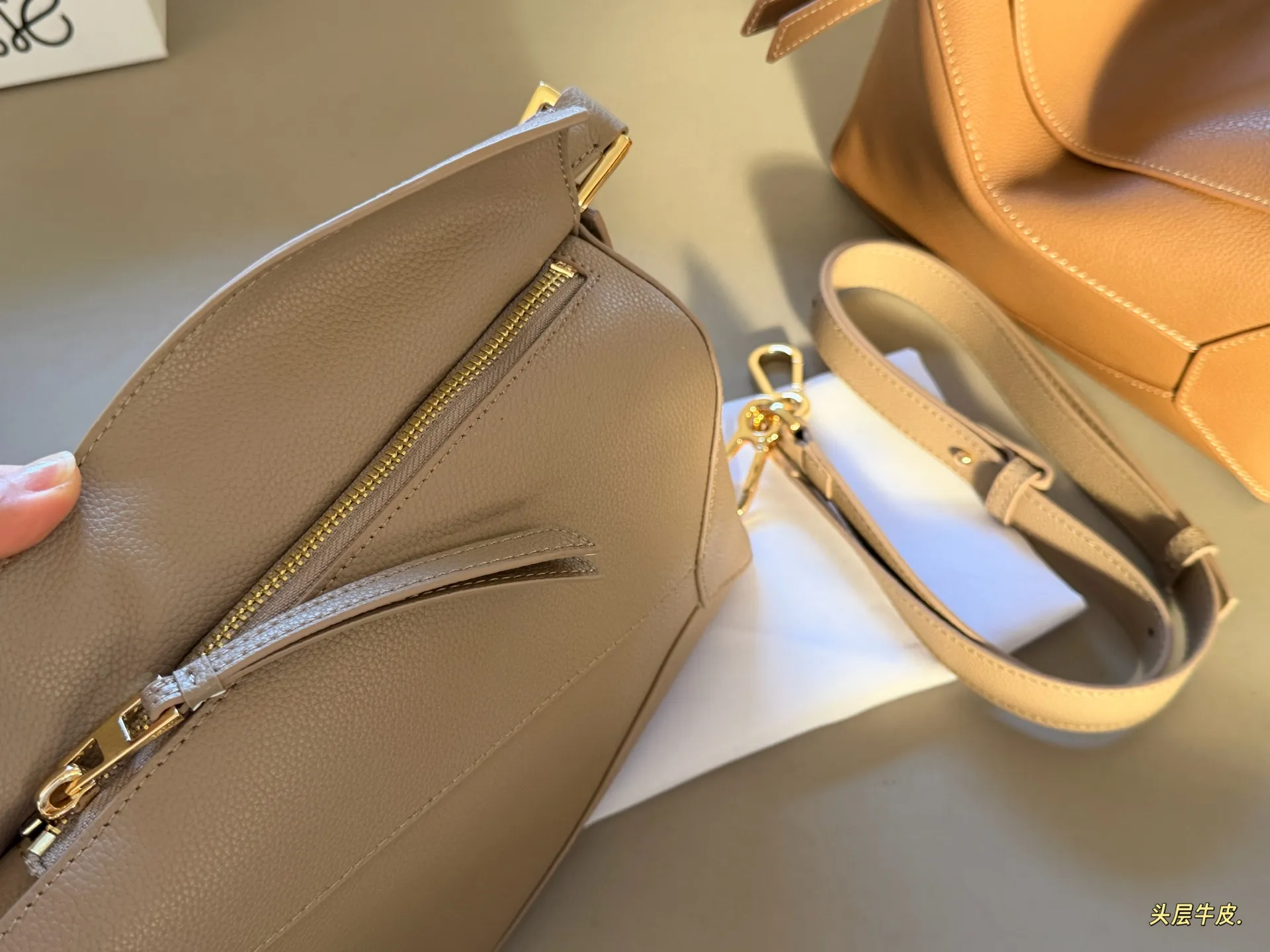 Puzzle Grained Leather Shoulder Bag D43018485 — view 9