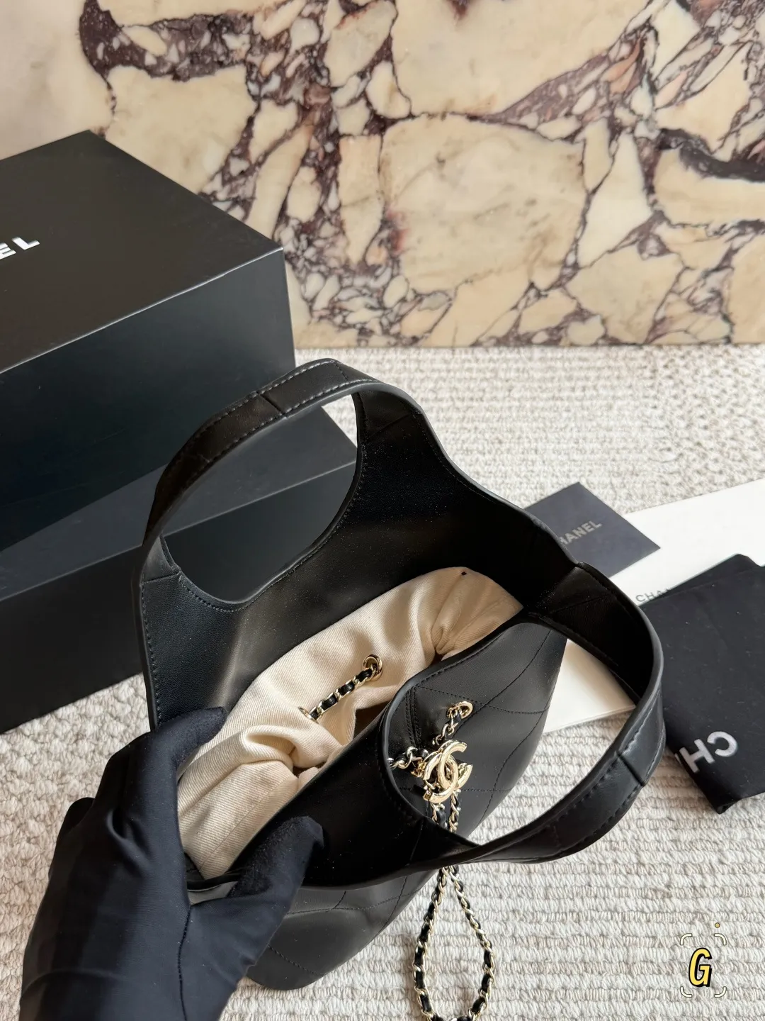 Chanel 26P Quilted Leather Bucket Bag D28517816 — view 6