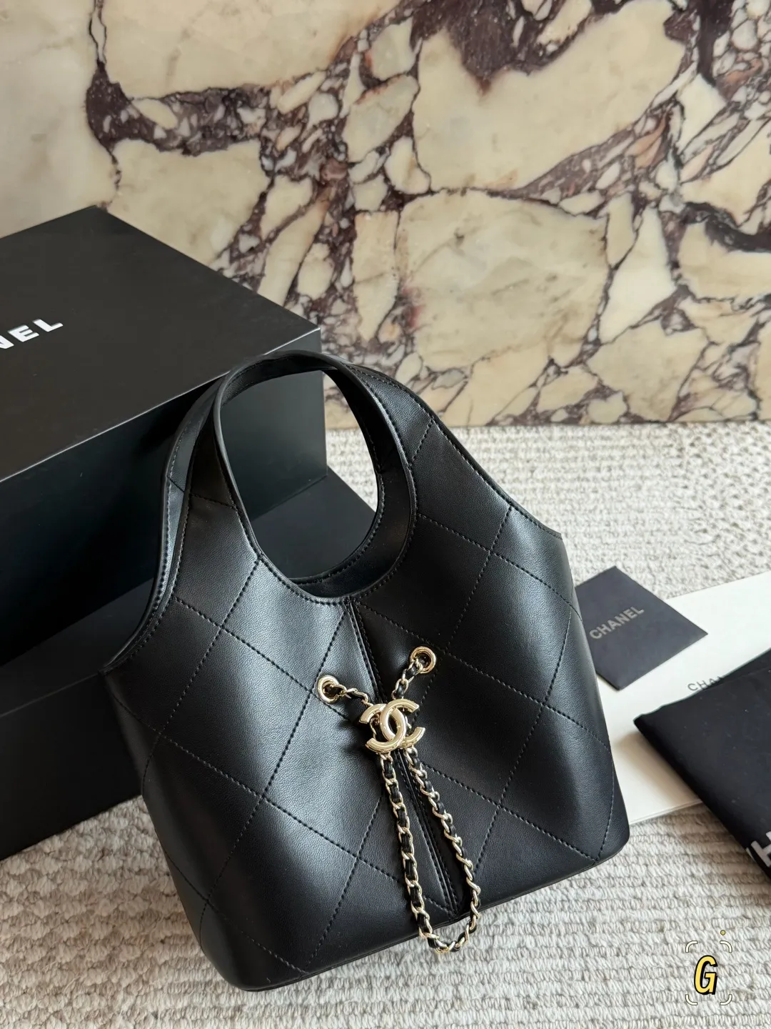 Chanel 26P Quilted Leather Bucket Bag D28517816 — view 9