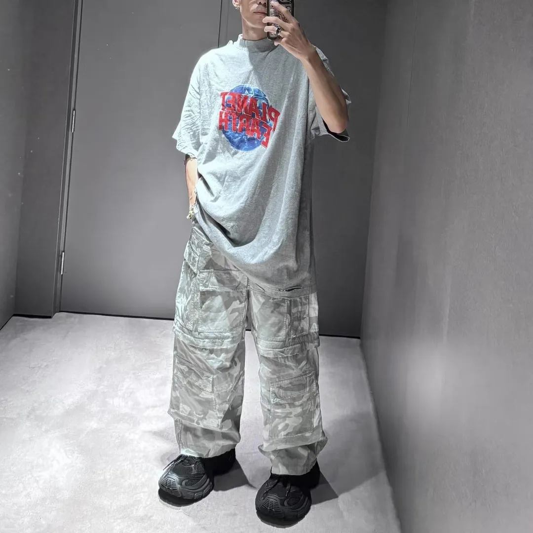 Balenciaga Hand-Painted Camouflage Cargo Trousers D23521845 — view 11