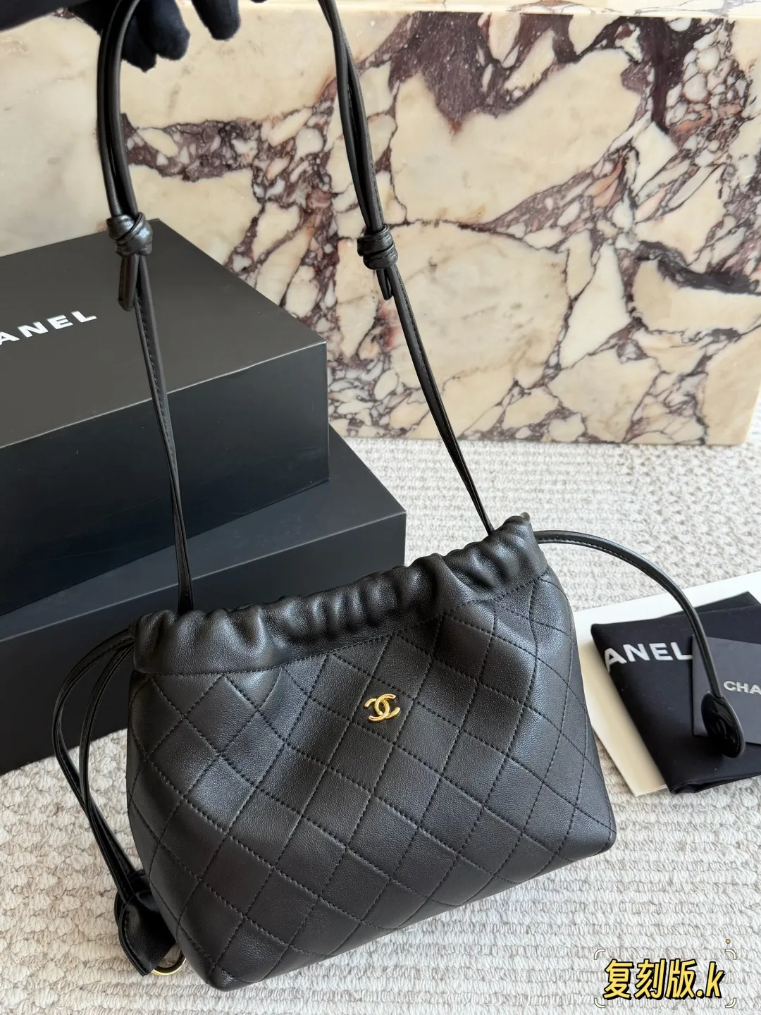 Chanel 26S Quilted Lambskin Drawstring Bucket Bag D34018235