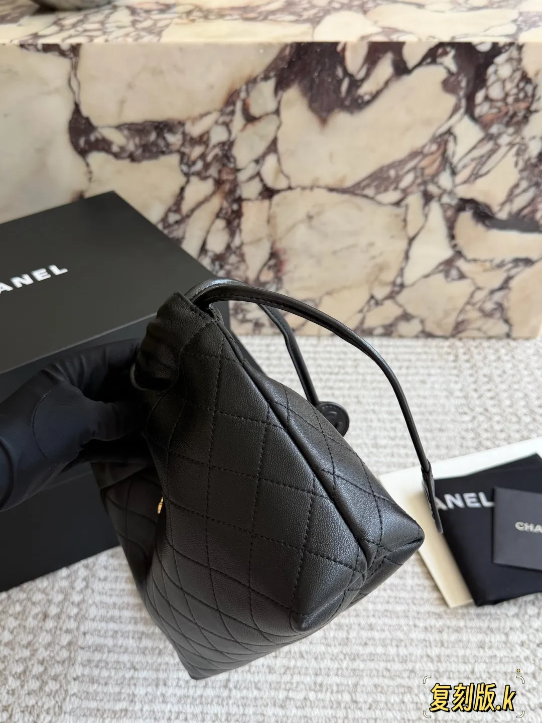 Chanel 26S Quilted Lambskin Drawstring Bucket Bag D34018235 — view 3