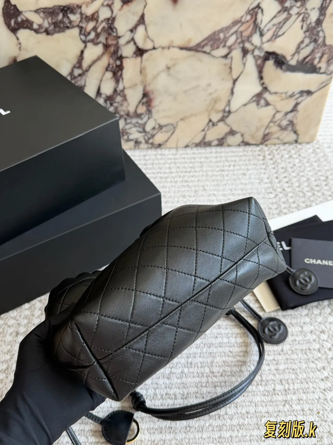 Chanel 26S Quilted Lambskin Drawstring Bucket Bag D34018235 — view 5