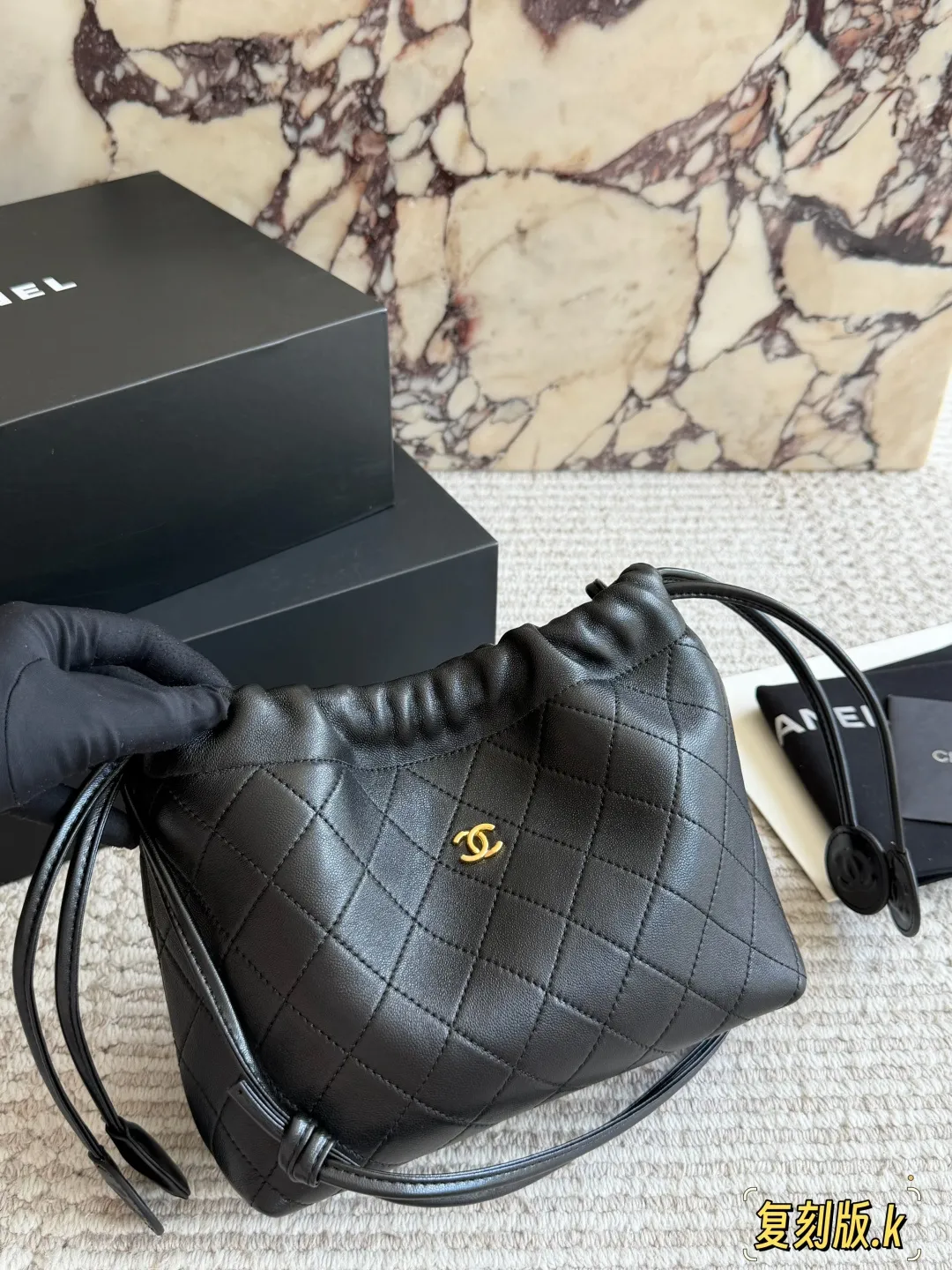 Chanel 26S Quilted Lambskin Drawstring Bucket Bag D34018235 — view 7