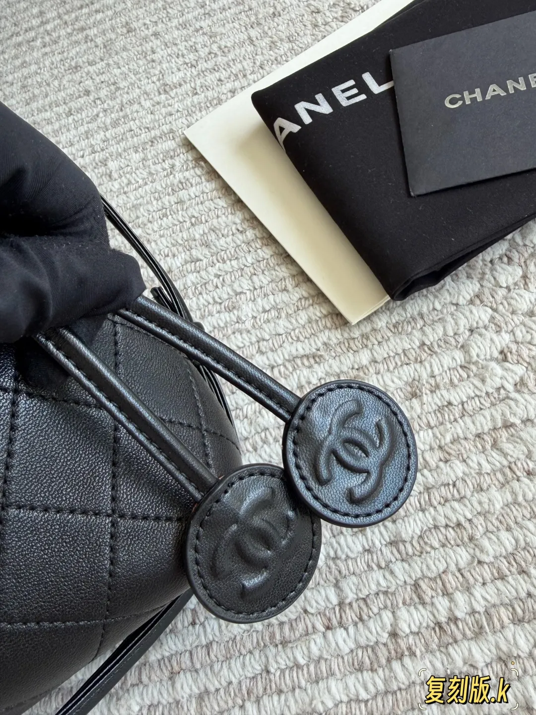 Chanel 26S Quilted Lambskin Drawstring Bucket Bag D34018235 — view 8
