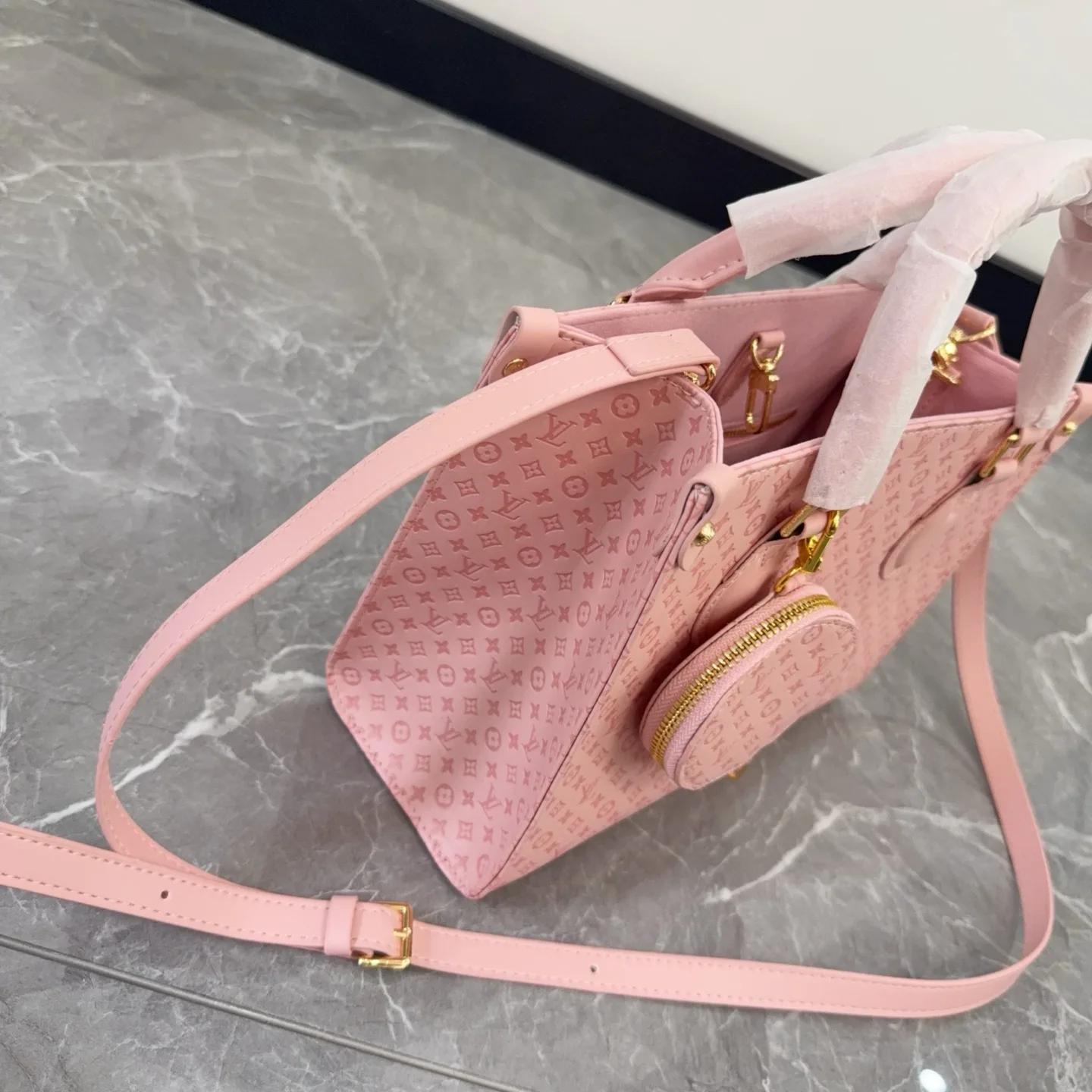 LV OnTheGo Embossed Pink Tote Bag D14511096 — view 7