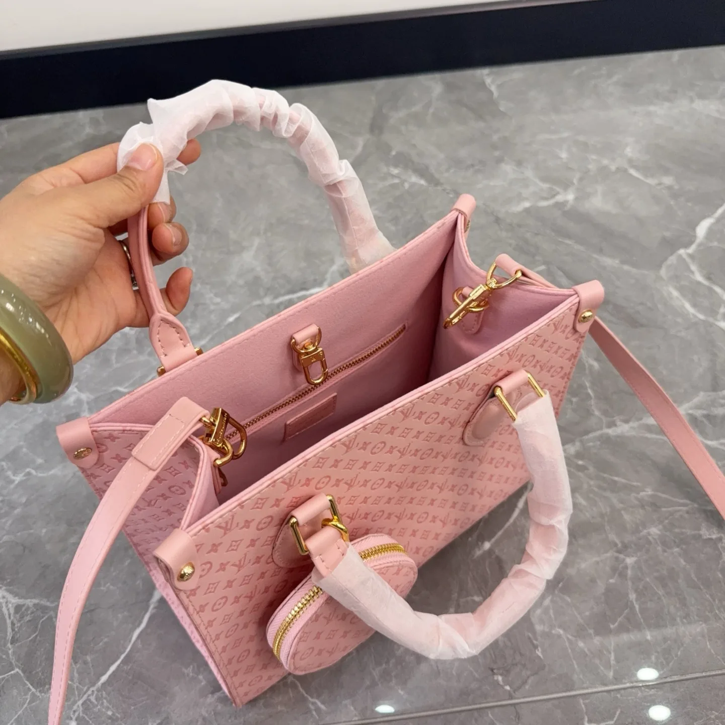 LV OnTheGo Embossed Pink Tote Bag D14511096 — view 8