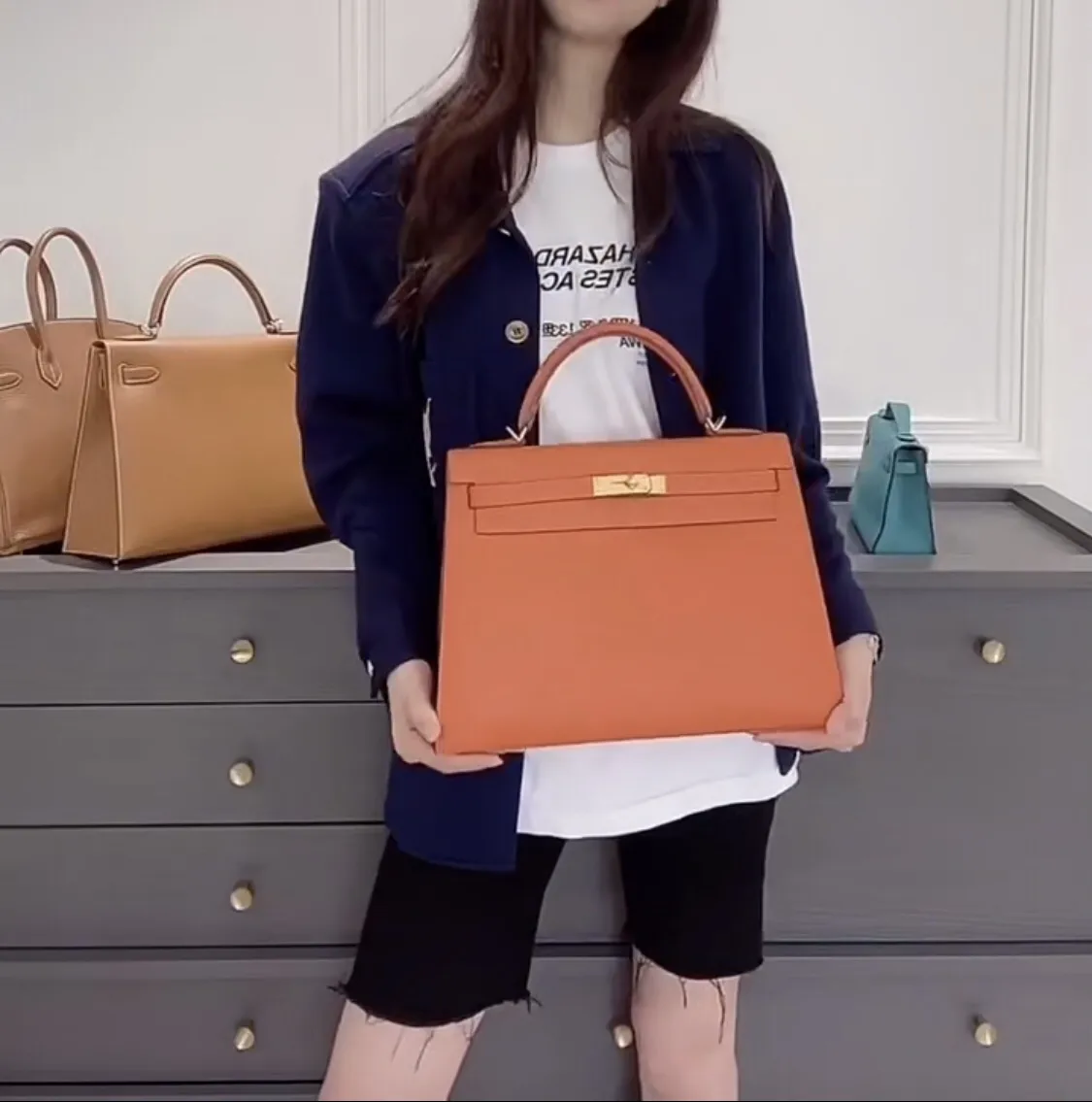 Hermès Kelly Orange Togo Leather Top-Handle Bag D60011118