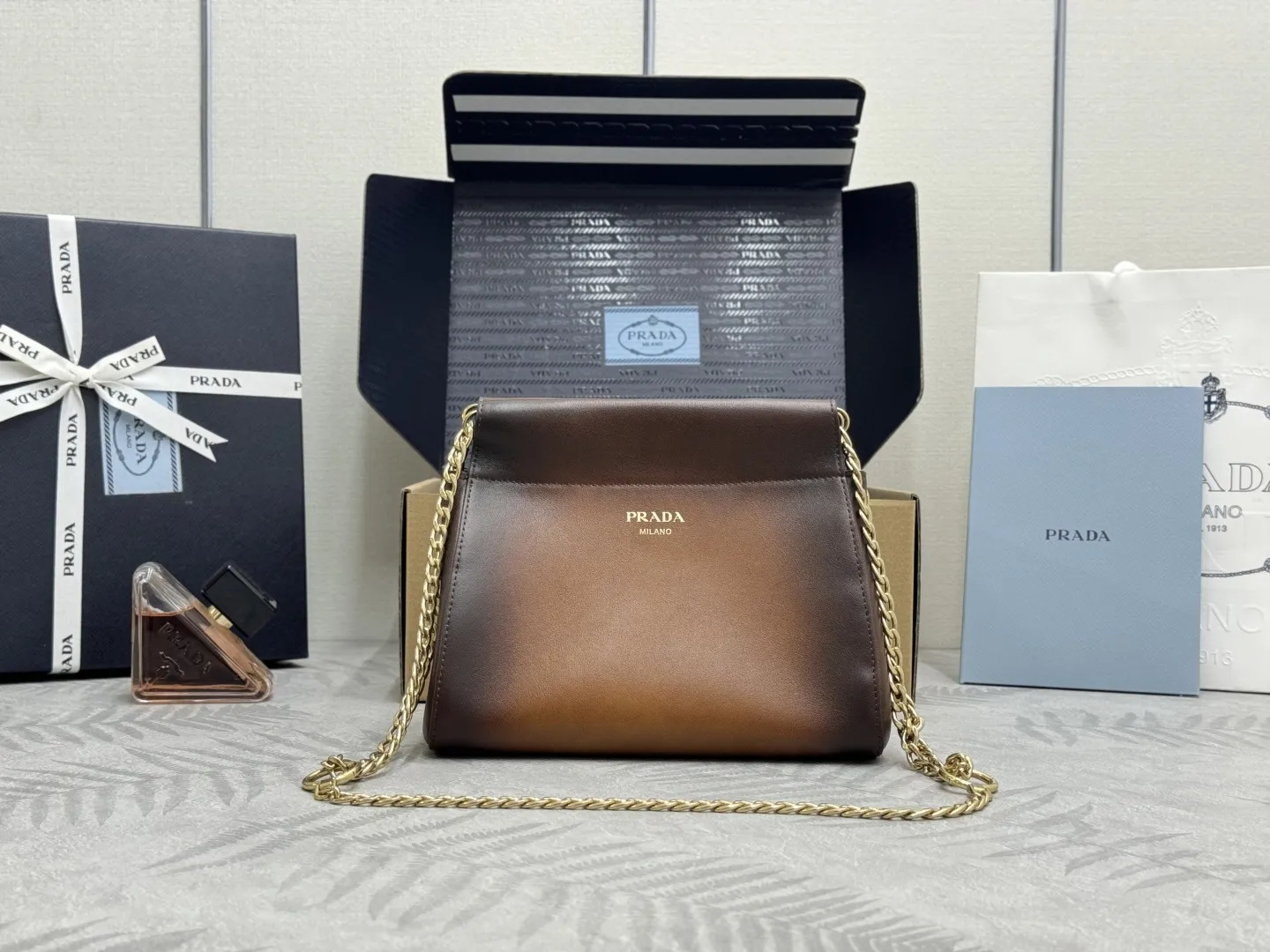 Prada Enchaîné Distressed Leather Mini Chain Bag D92011165