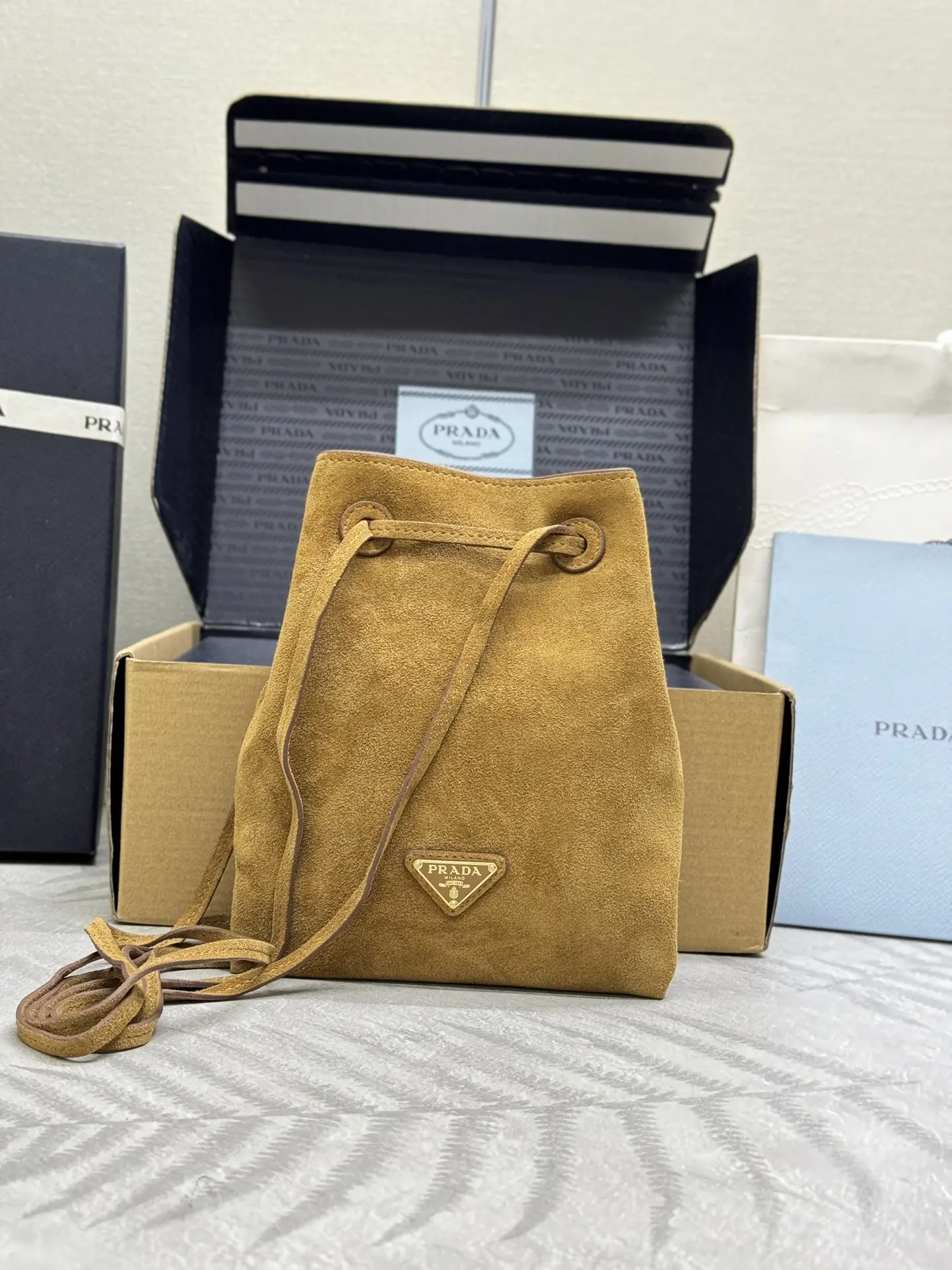 Suede Mini Drawstring Crossbody Bag D59011225