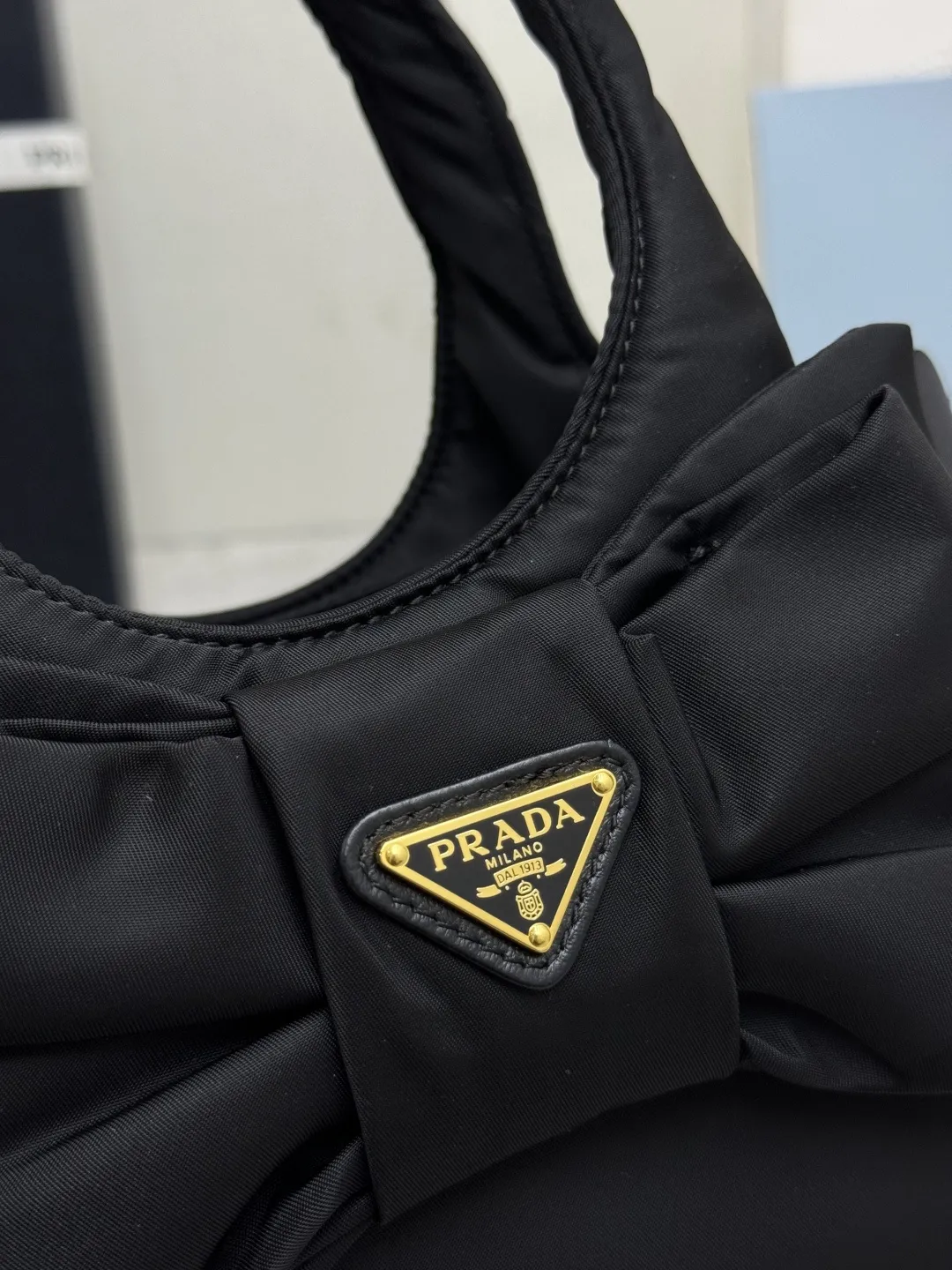 Prada Bow-Detail Padded Nylon Shoulder Bag D76011233 — view 7