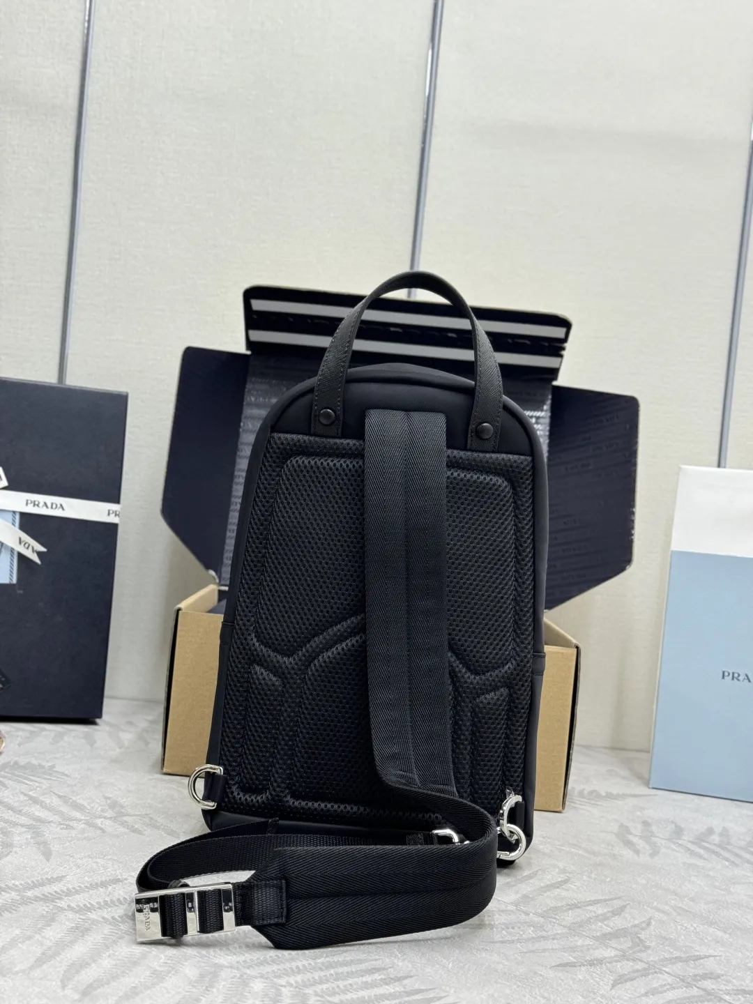 Re-Nylon and Saffiano Leather Sling Backpack D69011239 — view 2
