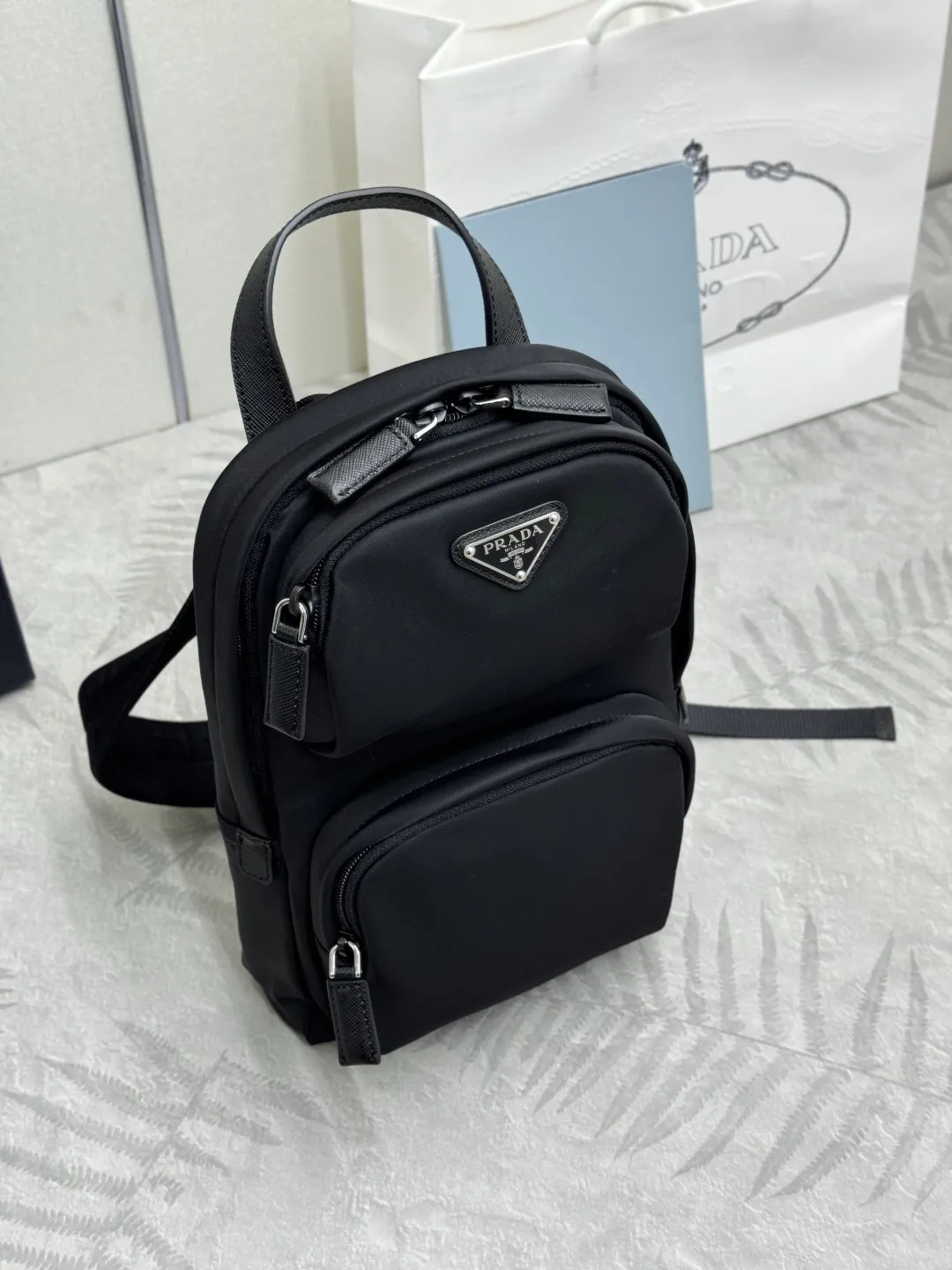 Re-Nylon and Saffiano Leather Sling Backpack D69011239 — view 3