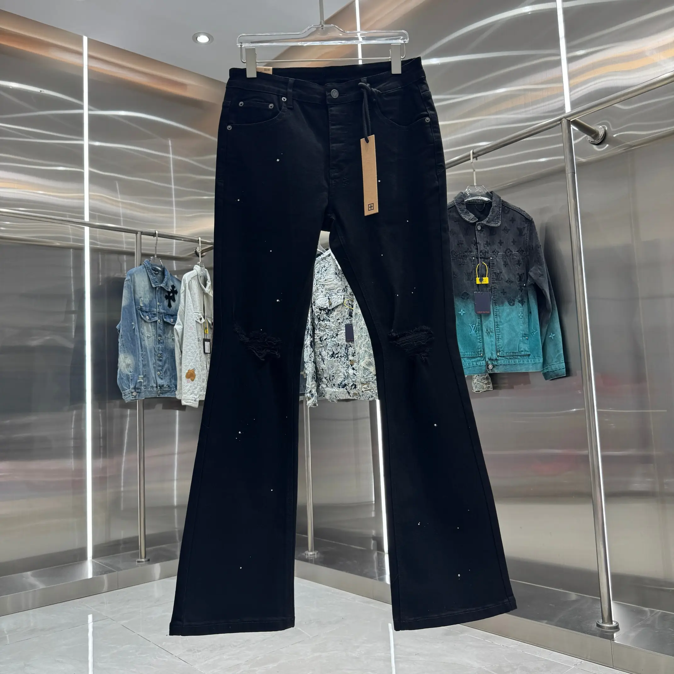 Distressed Flared Jeans with Paint Splatter D21019044