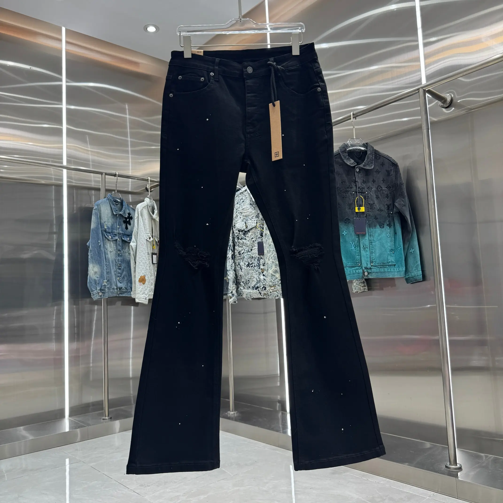 Distressed Flared Jeans with Paint Splatter D21019044