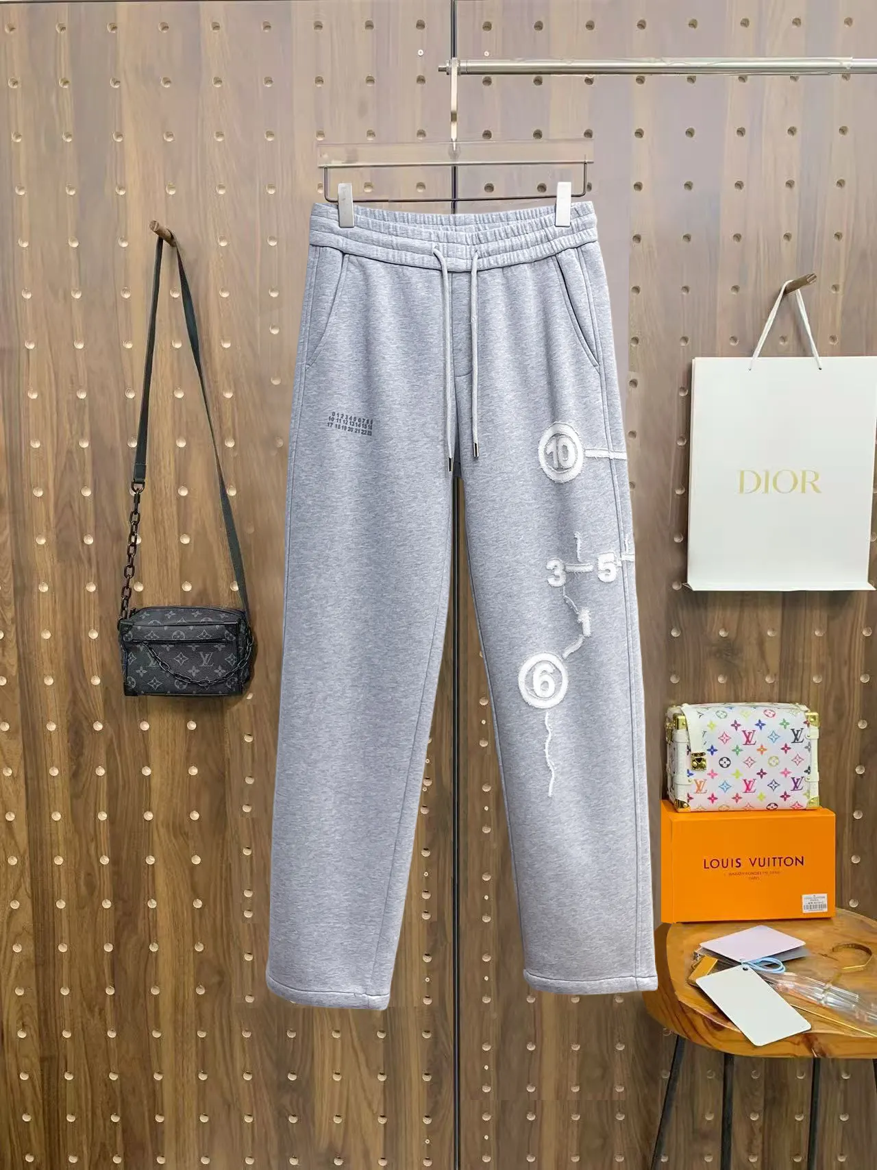 Maison Margiela Logo Graphic Sweatpants D29015050