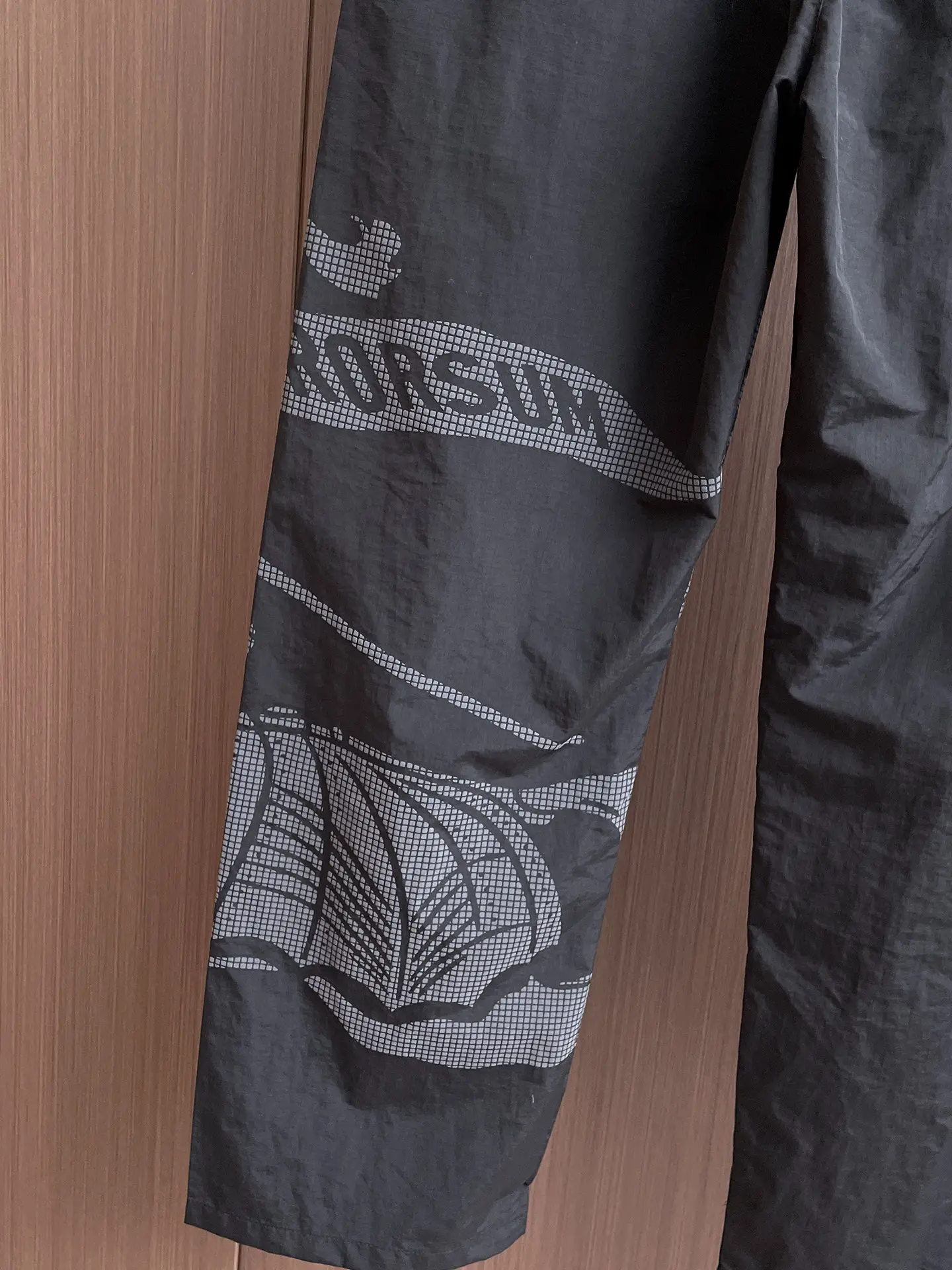 Logo-Print Technical Shell Trousers D30014828 — view 7
