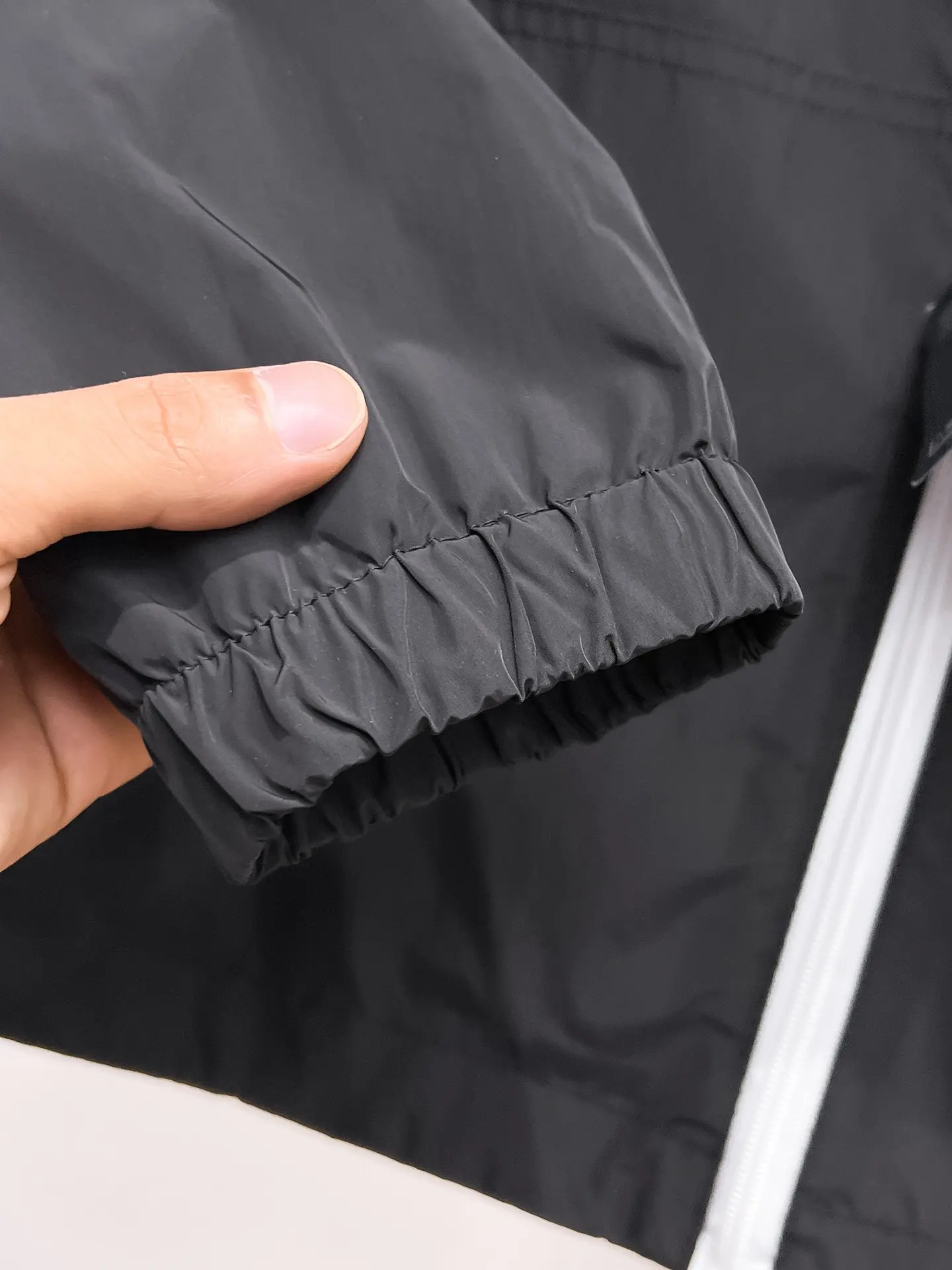 Logo-Appliquéd Hooded Shell Jacket D33014764 — view 12