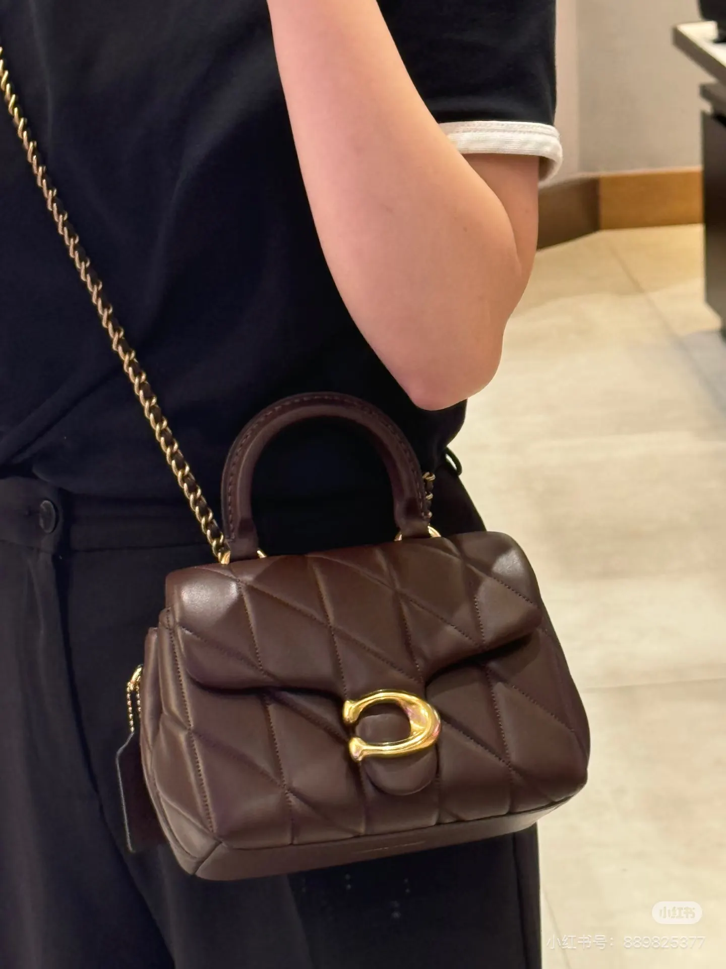 Tabby Quilted Leather Top Handle Bag D34017973