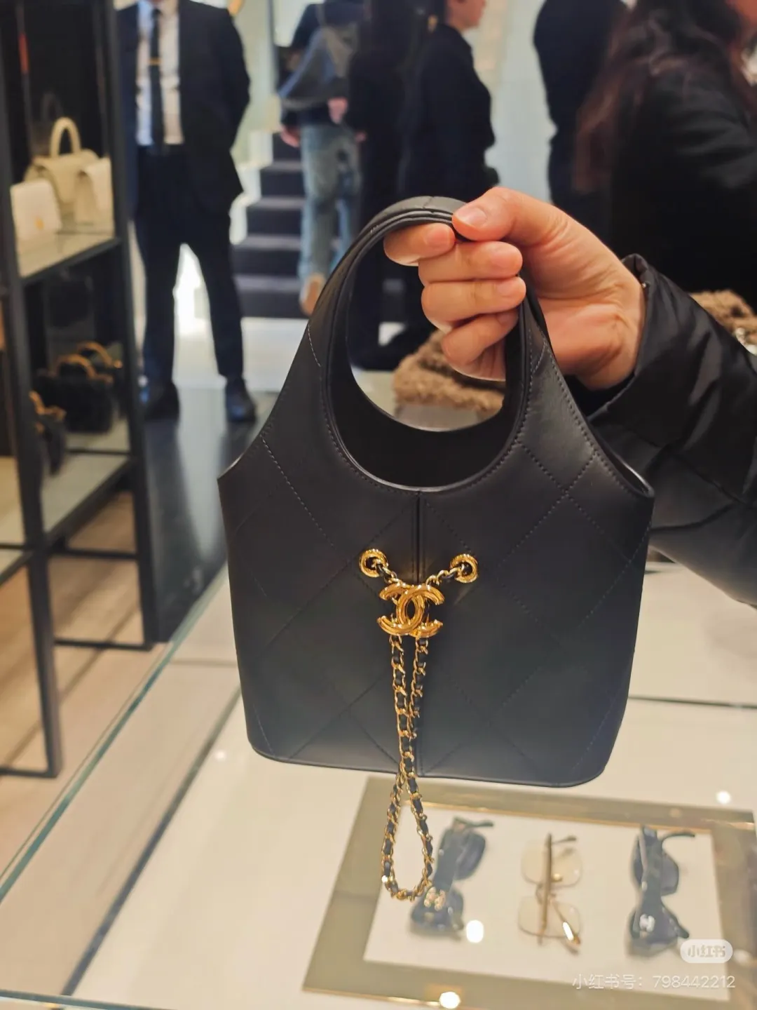Chanel Quilted Leather Bucket Bag D28517814 — view 3