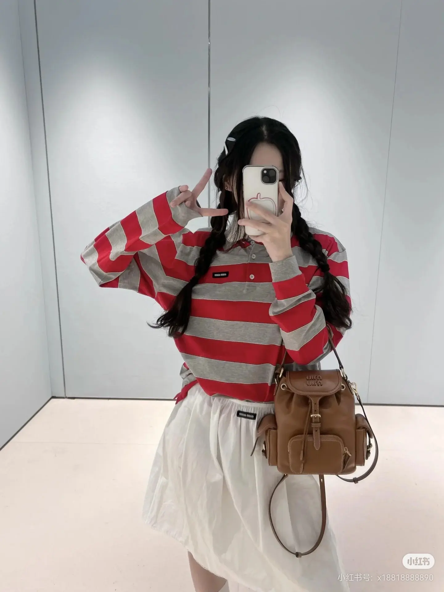 Striped Long-Sleeve Polo Shirt D16523813