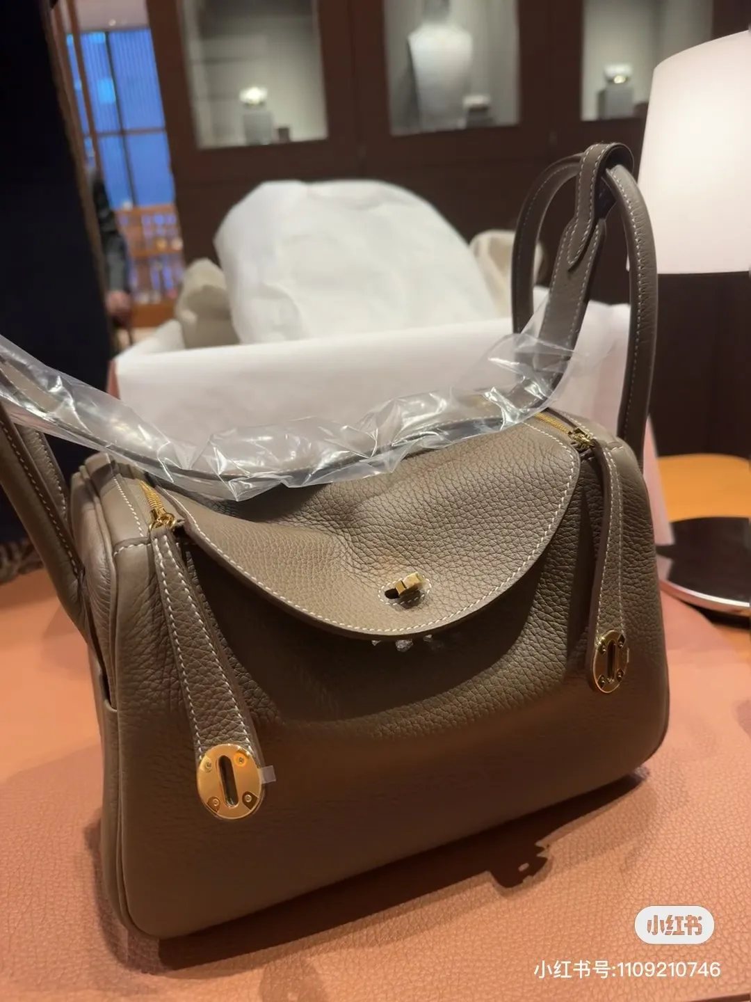 Lindy Top-Handle Bag in Togo Leather D43018503 — view 8